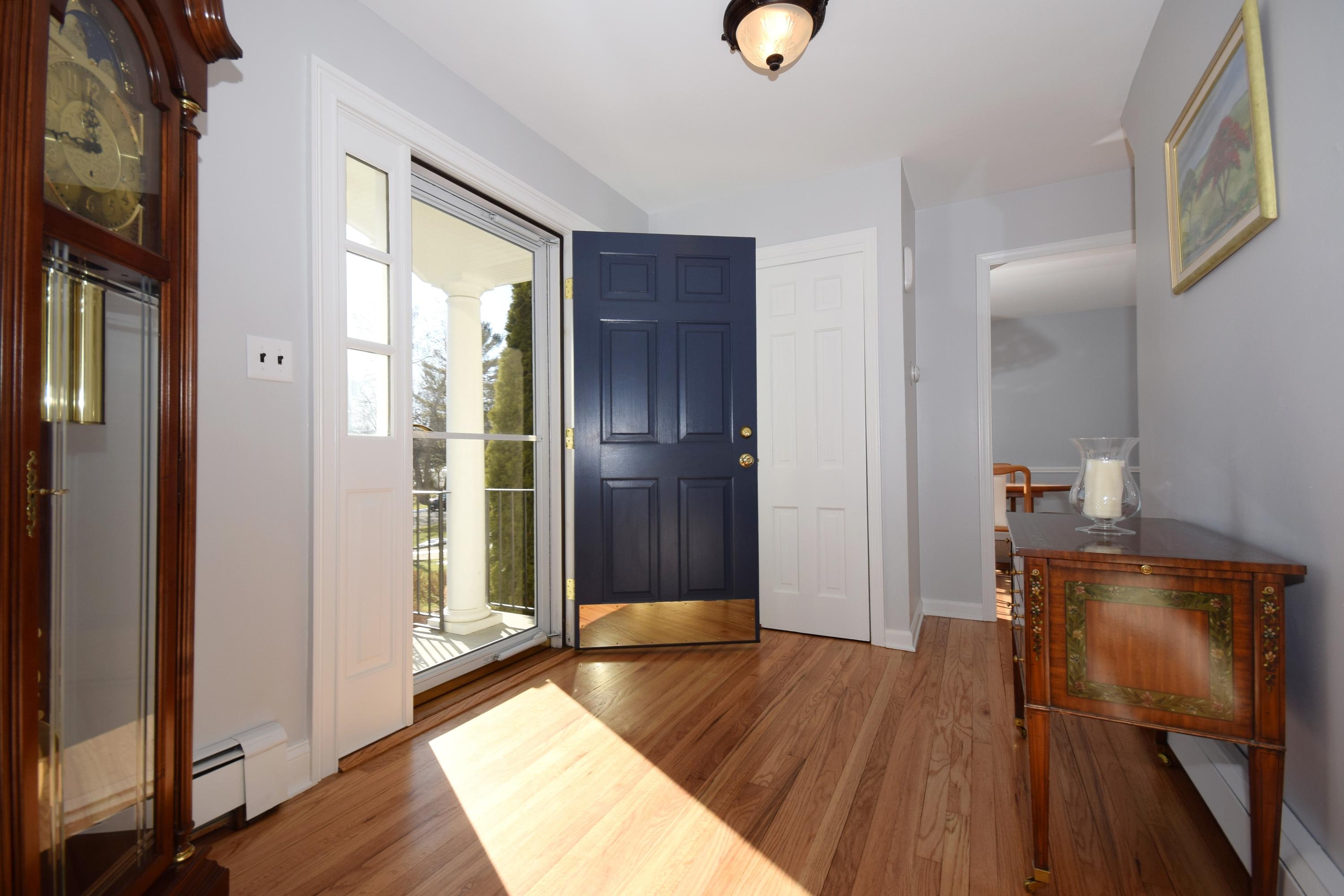 6 Wilson Ridge Road East Darien, CT 06820 - Photo 3 of 25 a view of a hallway with wooden floor and closet