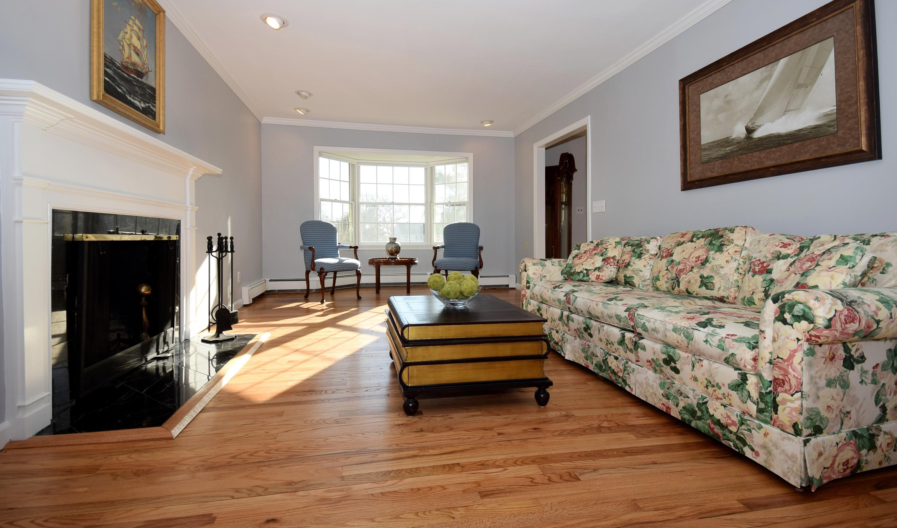 6 Wilson Ridge Road East Darien, CT 06820 - Photo 5 of 25 a living room with furniture and a fireplace