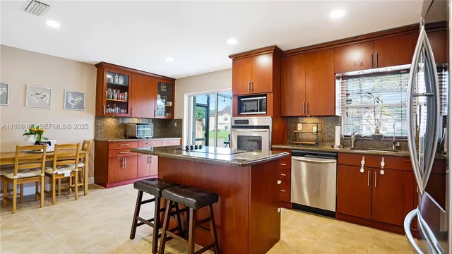 $560,000 | 10717 Northwest 12th Manor, Plantation, FL 33322