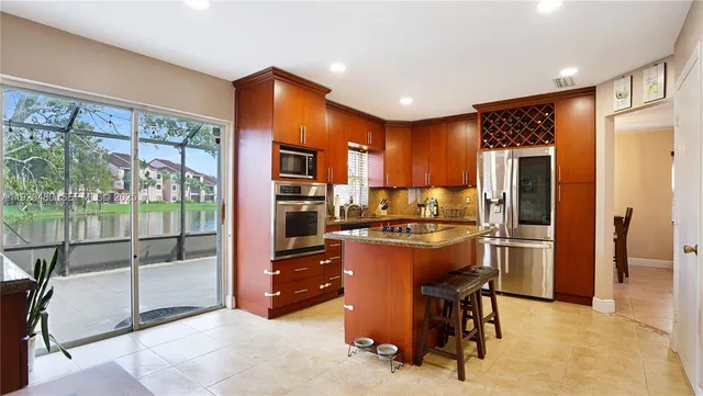 $560,000 | 10717 Northwest 12th Manor, Plantation, FL 33322