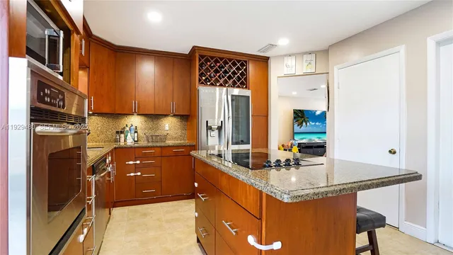 $560,000 | 10717 Northwest 12th Manor, Plantation, FL 33322