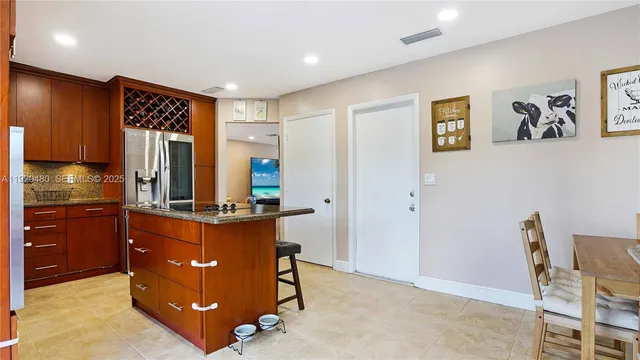 $560,000 | 10717 Northwest 12th Manor, Plantation, FL 33322