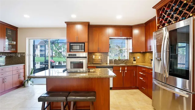 $560,000 | 10717 Northwest 12th Manor, Plantation, FL 33322