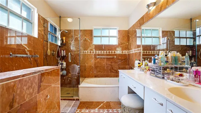 $560,000 | 10717 Northwest 12th Manor, Plantation, FL 33322