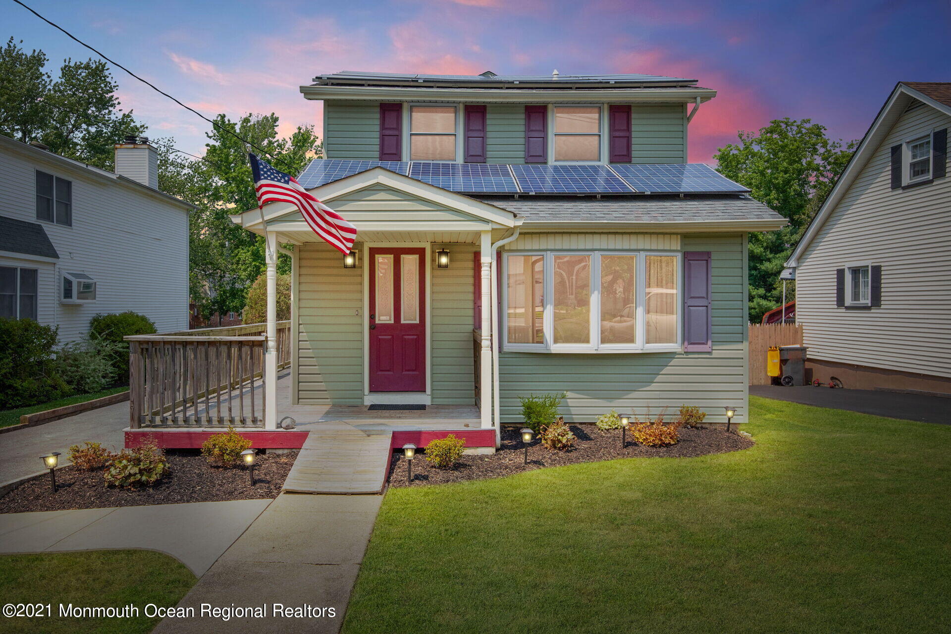 a house view with a garden space