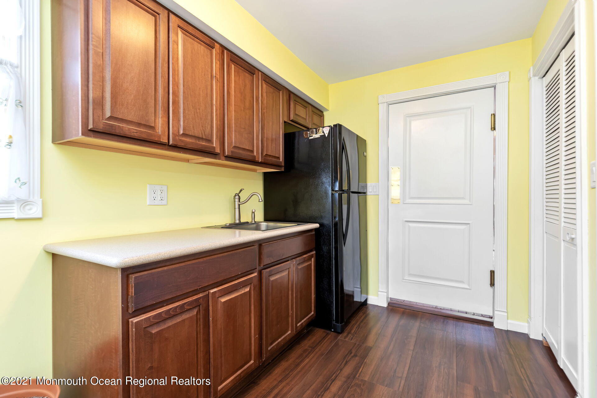 107 Aberdeen Road Aberdeen, NJ 07747 - Photo 11 of 32 a kitchen with stainless steel appliances granite countertop a refrigerator and a sink