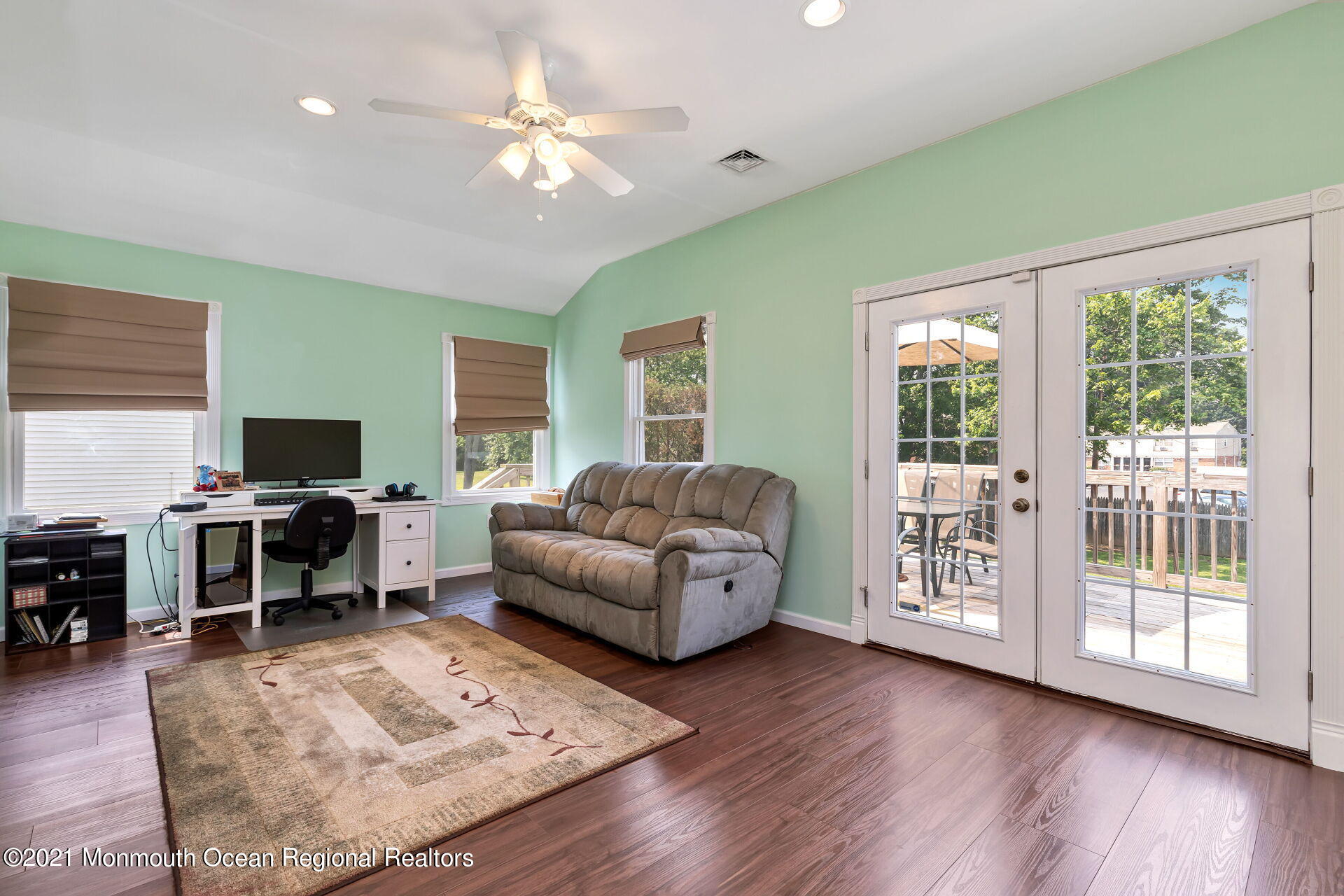 107 Aberdeen Road Aberdeen, NJ 07747 - Photo 15 of 32 a living room with furniture and a flat screen tv