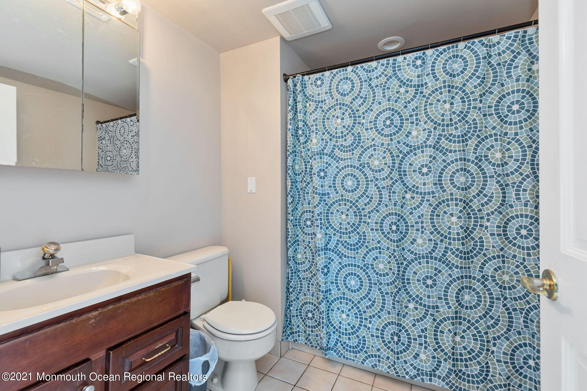 107 Aberdeen Road Aberdeen, NJ 07747 - Photo 21 of 32 a bathroom with a toilet and a sink