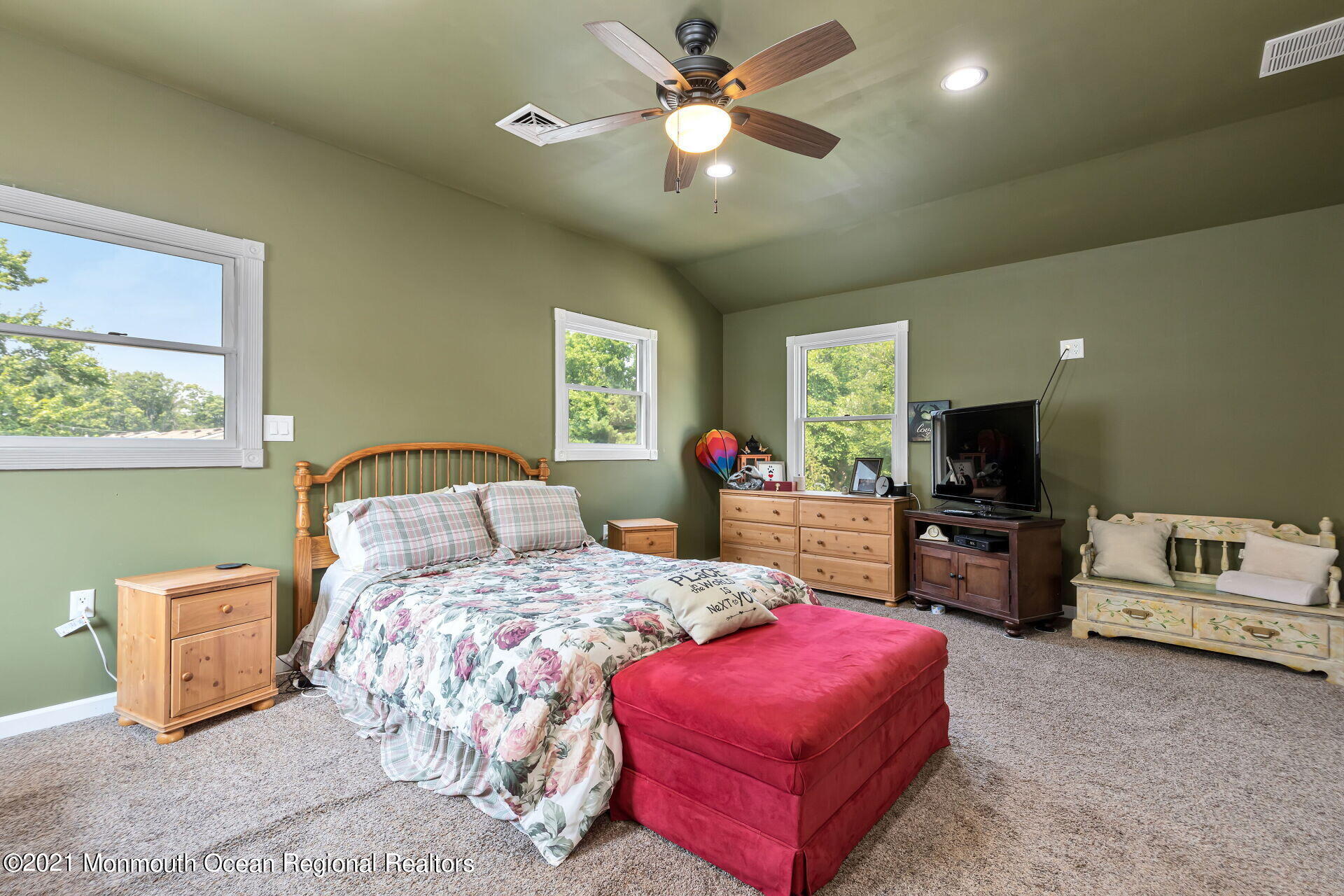 107 Aberdeen Road Aberdeen, NJ 07747 - Photo 23 of 32 a bedroom with a bed and a flat screen tv