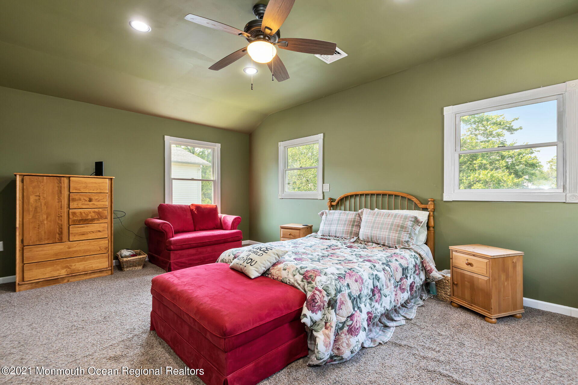 107 Aberdeen Road Aberdeen, NJ 07747 - Photo 24 of 32 a bedroom with a bed and a chandelier