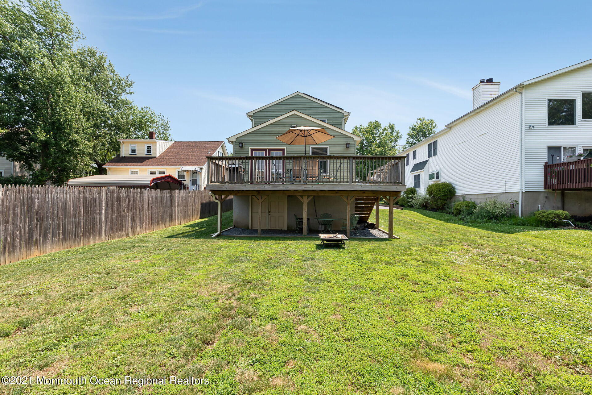 107 Aberdeen Road Aberdeen, NJ 07747 - Photo 28 of 32 a view of a house with a yard and sitting area