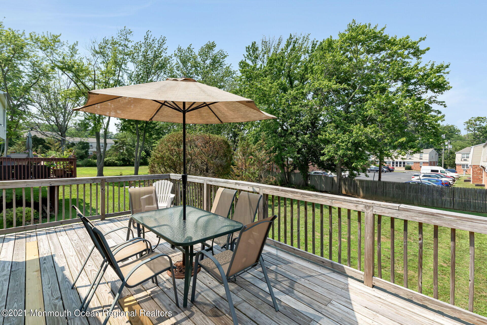 107 Aberdeen Road Aberdeen, NJ 07747 - Photo 30 of 32 a view of a chair and table on the deck