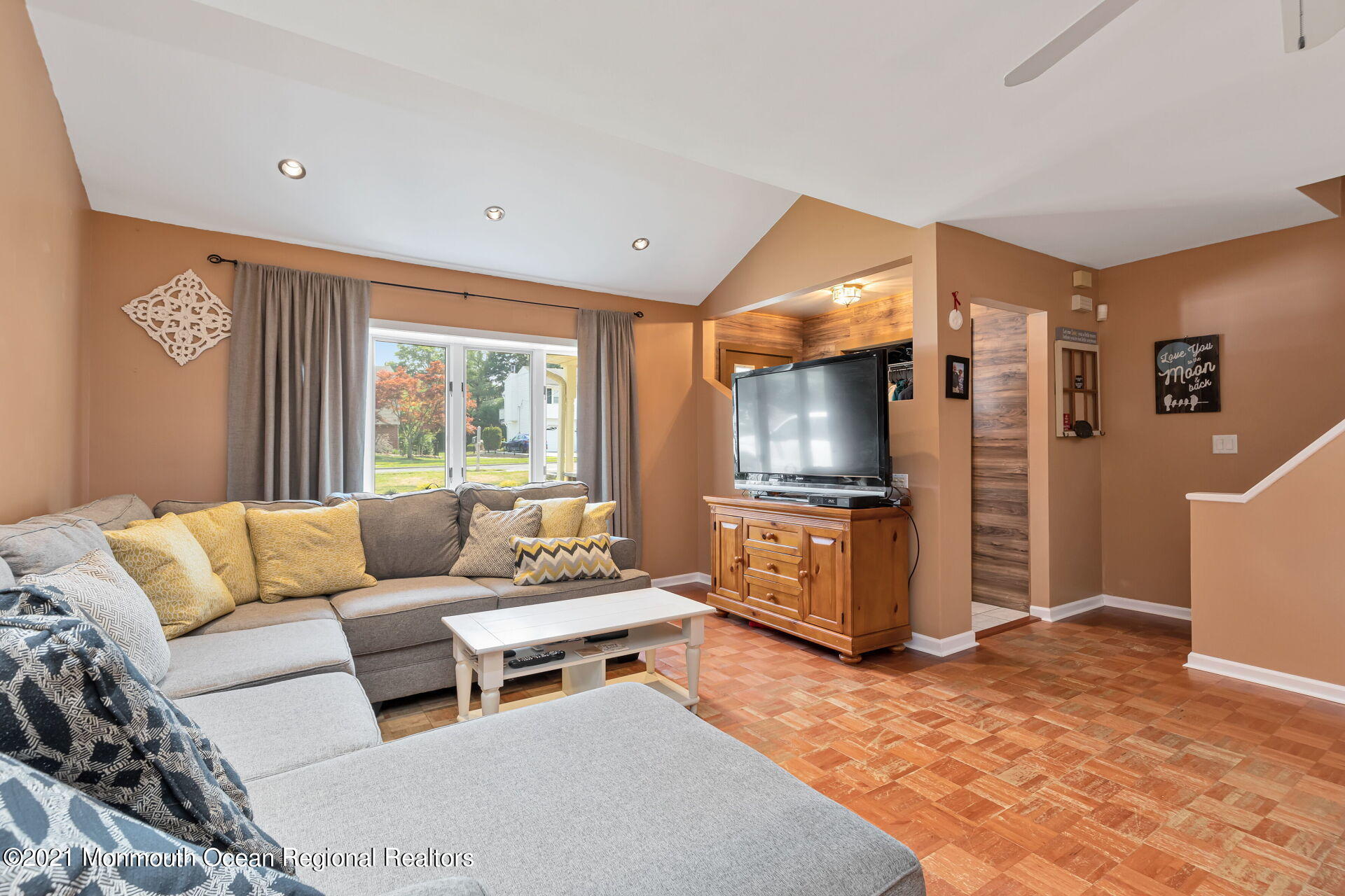 107 Aberdeen Road Aberdeen, NJ 07747 - Photo 5 of 32 a living room with furniture and a flat screen tv