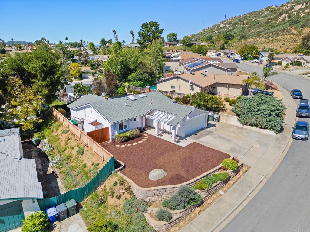 13439 Orange Blossom Lane Poway, CA 92064 - Photo 23 of 36 an aerial view of residential houses with outdoor space