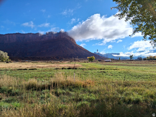 437 West Rimrock Lane, Unit 437 Moab, UT 84532 - Photo 1 of 9 View of mountain backdrop with rural landscape