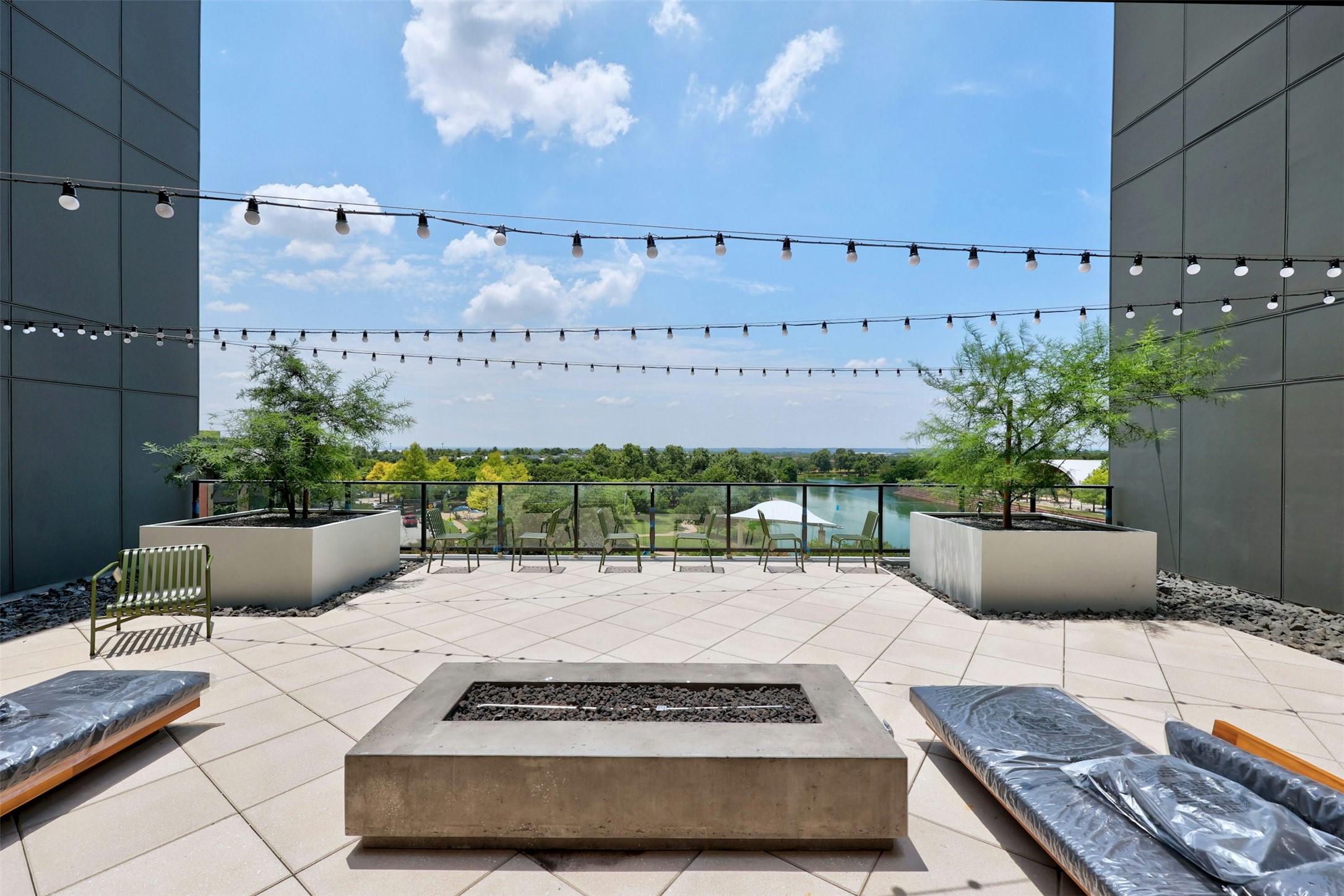 1701 Simond Avenue, Unit 411 Austin, TX 78723 - Photo 23 of 34 View of patio / terrace with an outdoor fire pit