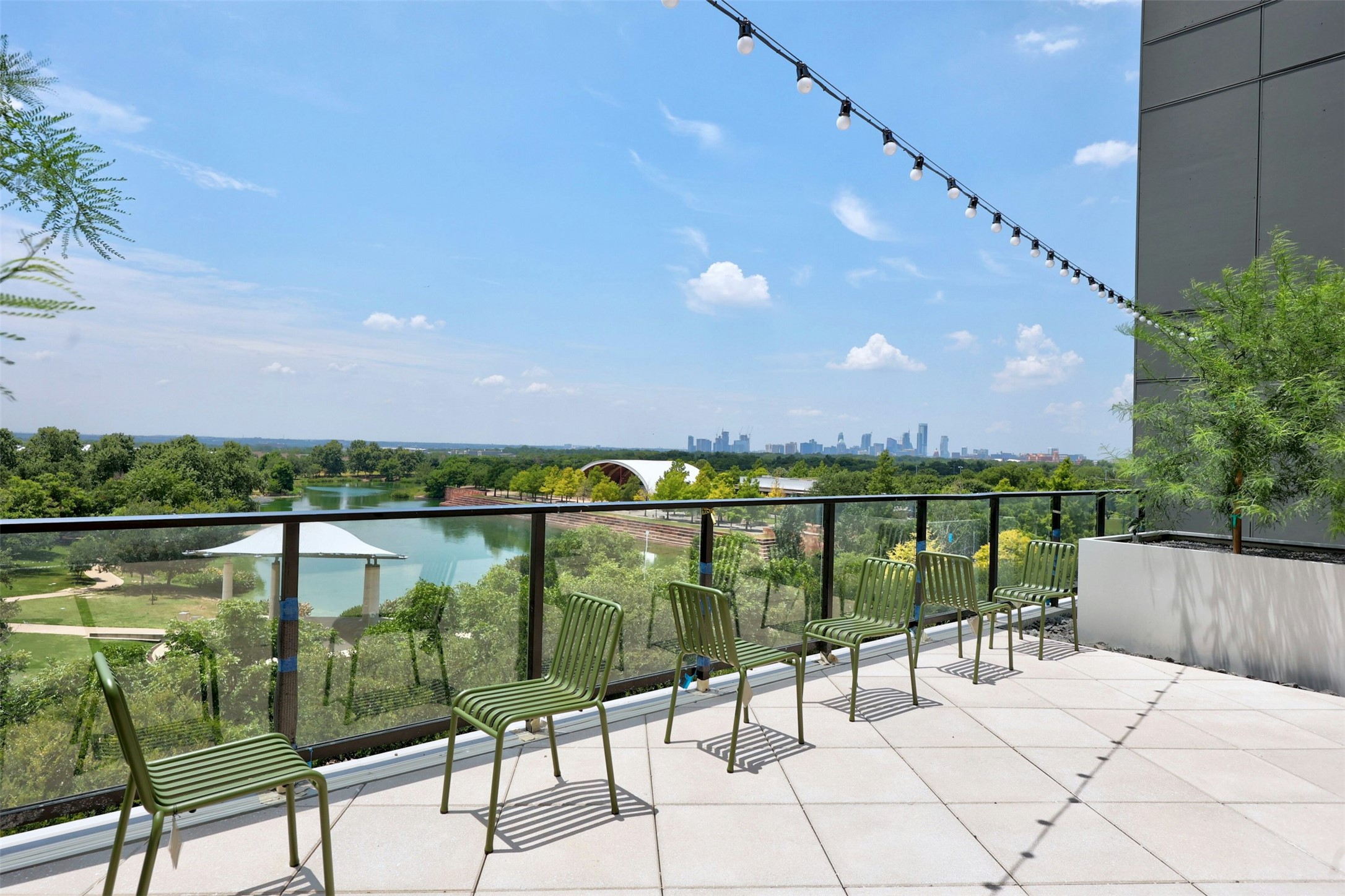 1701 Simond Avenue, Unit 411 Austin, TX 78723 - Photo 31 of 34 Balcony with a skyline view
