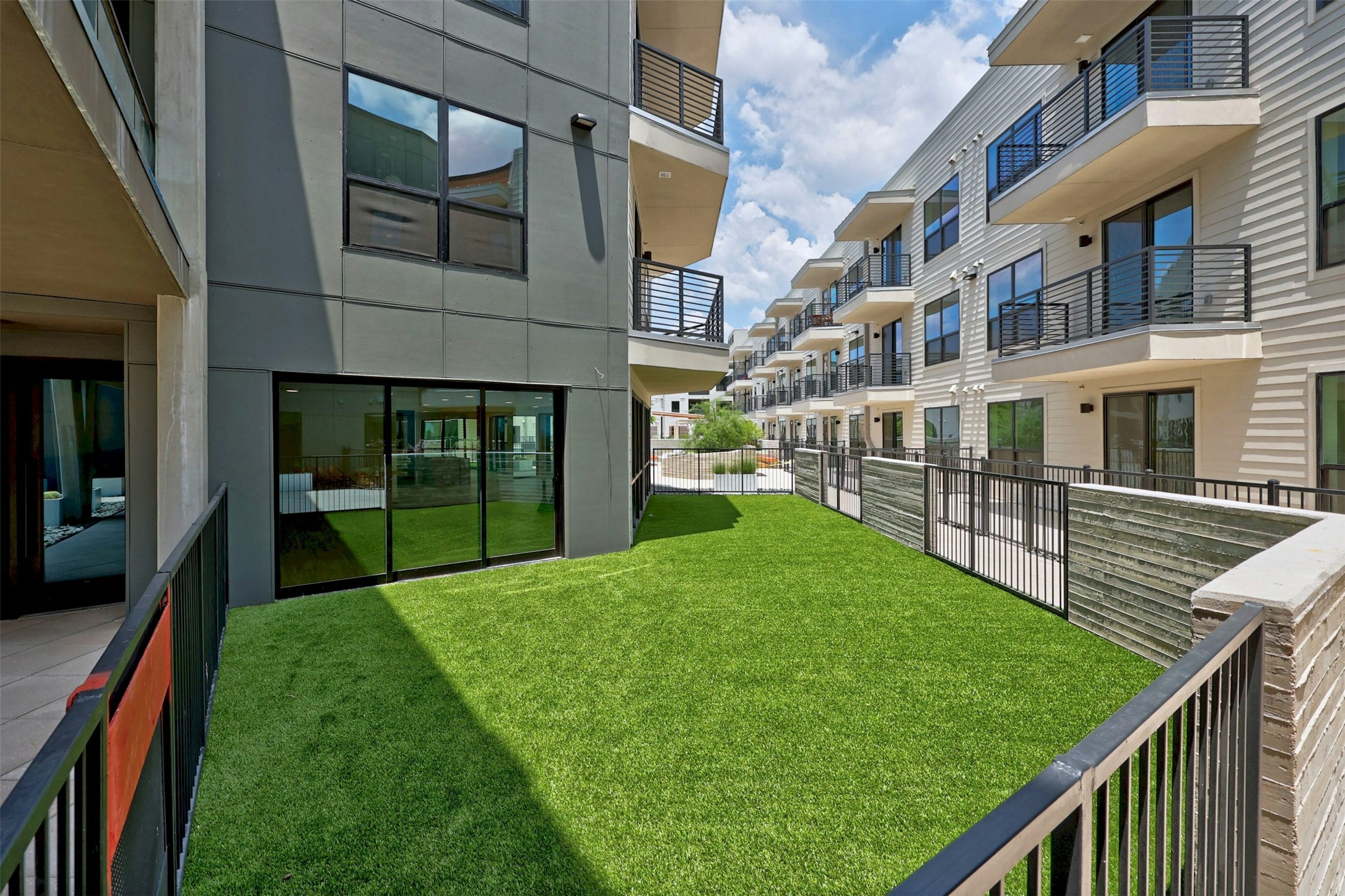 1701 Simond Avenue, Unit 411 Austin, TX 78723 - Photo 34 of 34 View of yard featuring a residential view