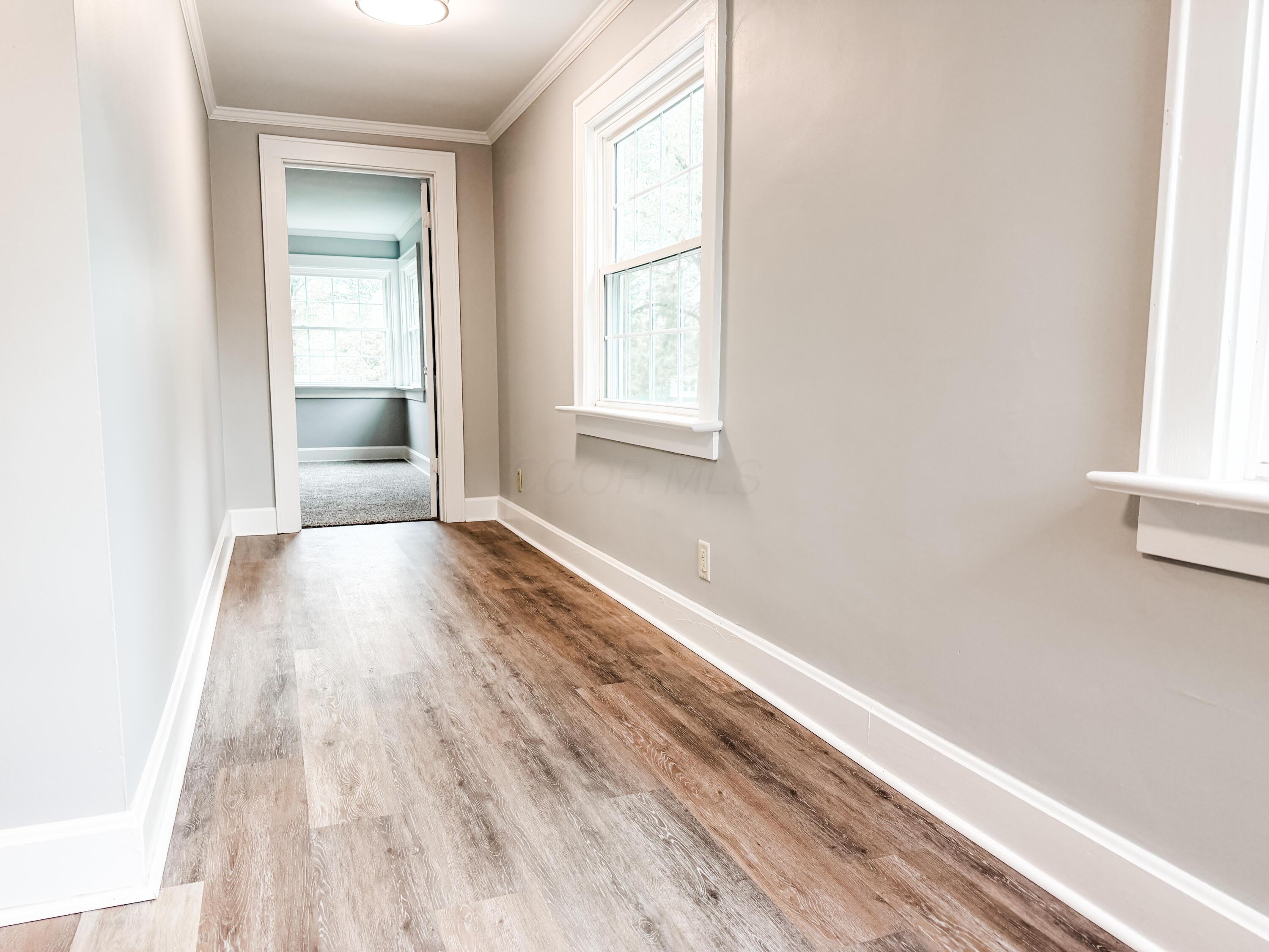 1693 Baltimore Road Northwest Lancaster, OH 43130 - Photo 26 of 38 Large hallway that could have a desk added shelving, cabinetry, etc