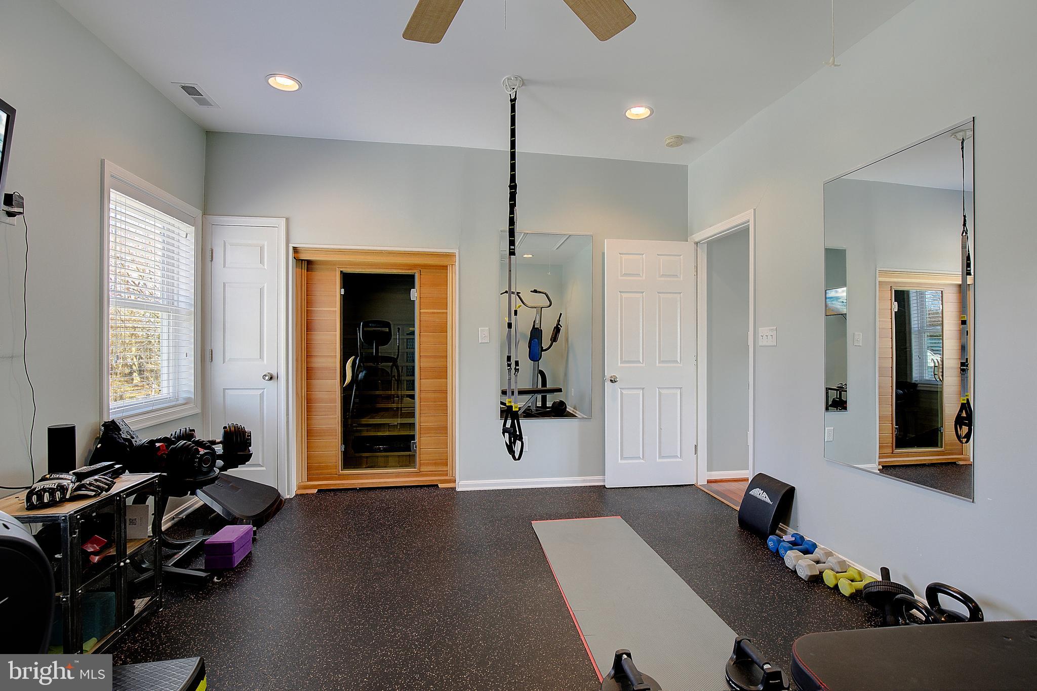 8113 Ventnor Road Pasadena, MD 21122 - Photo 32 of 45 Custom-built gym and sauna