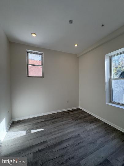 3625 North 22nd Street, Unit 1 Philadelphia, PA 19140 - Photo 6 of 9 a view of empty room with window and wooden floor