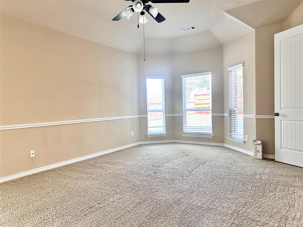 12135 Jasmine Lane Frisco, TX 75035 - Photo 12 of 31 an empty room with a empty space and windows