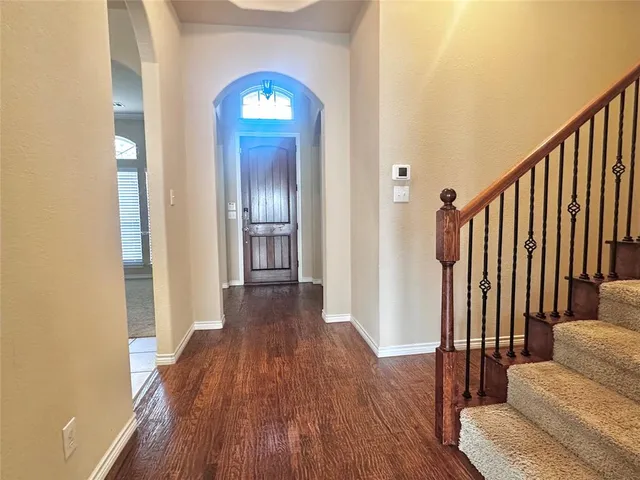 a view of a livingroom from a hallway