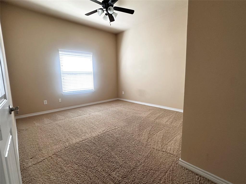 12135 Jasmine Lane Frisco, TX 75035 - Photo 23 of 31 an empty room with a window