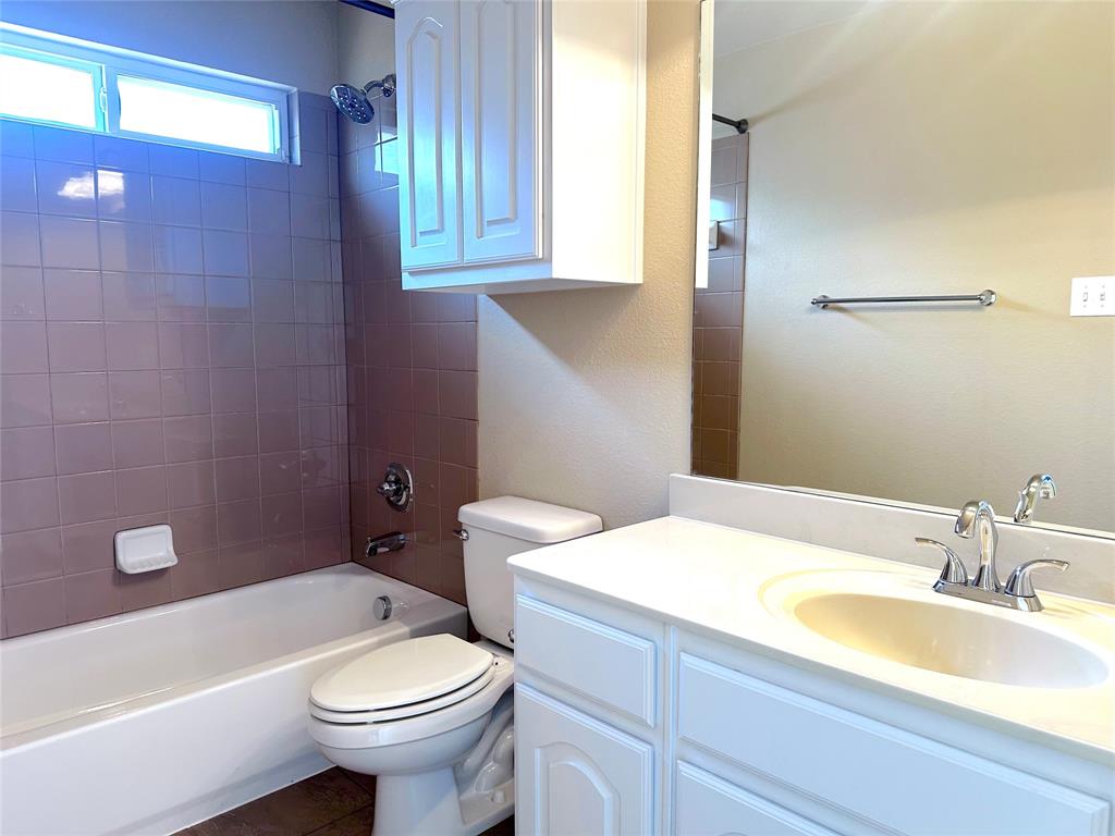 12135 Jasmine Lane Frisco, TX 75035 - Photo 27 of 31 a bathroom with a sink and a toilet