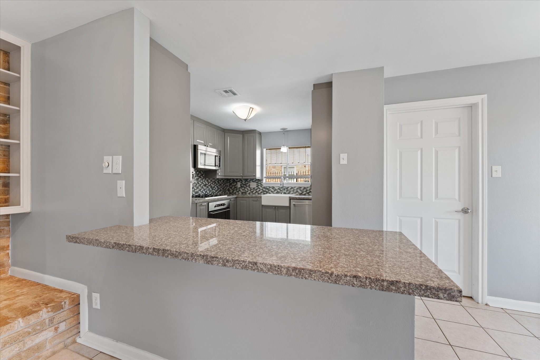 954 Chamboard Lane Houston, TX 77018 - Photo 23 of 36 a large bathroom with a granite countertop sink