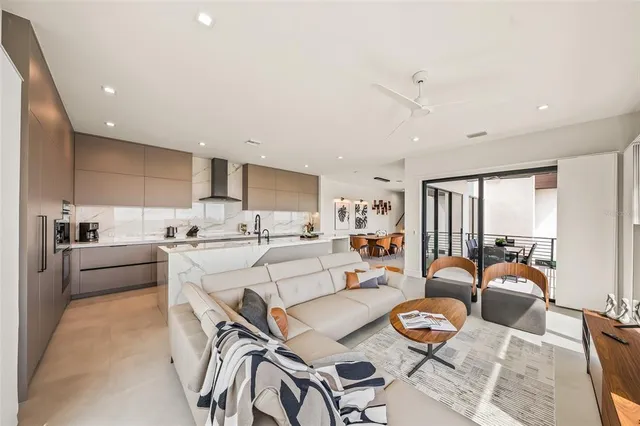 a bedroom with a large bed and a large window