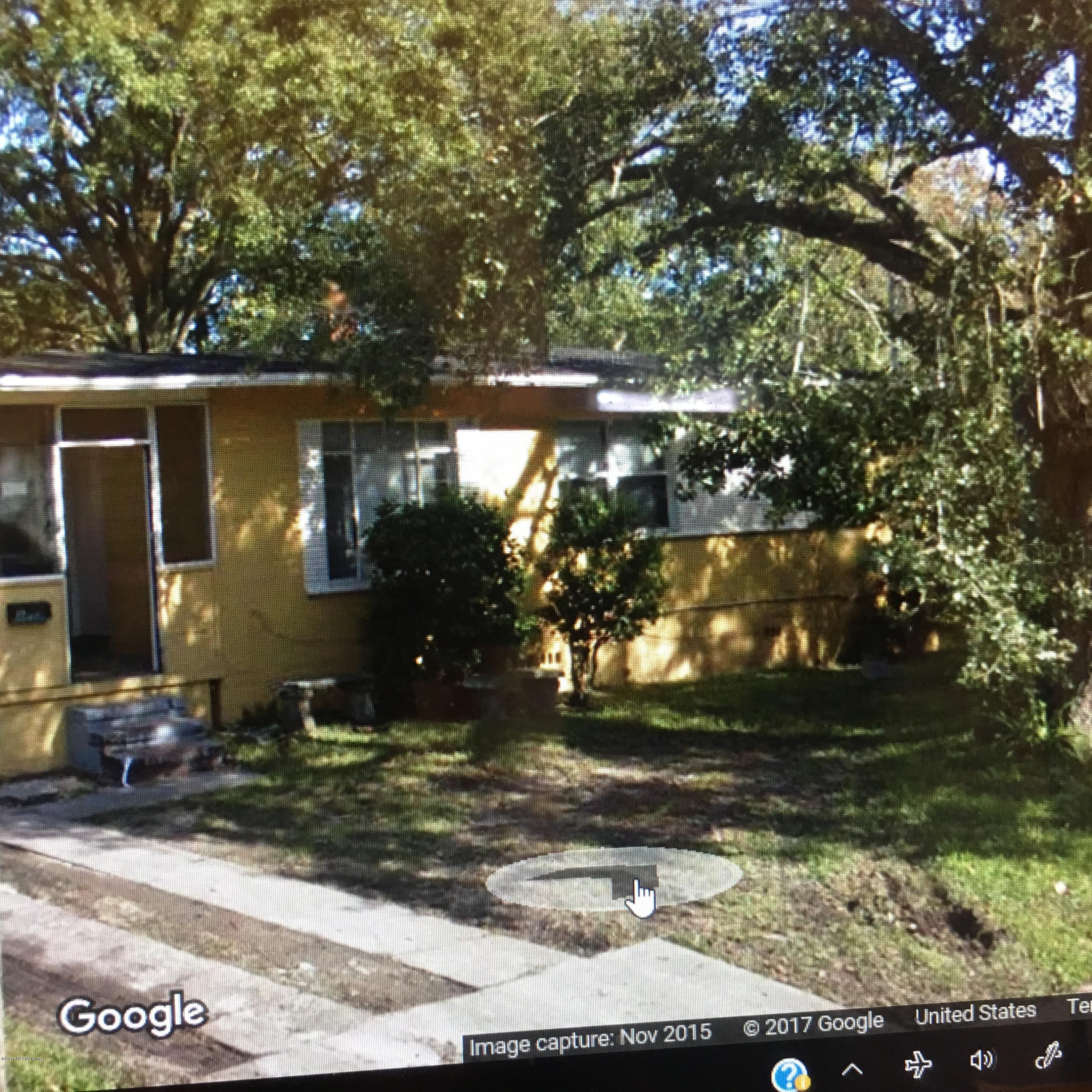5409 Cleveland Road Jacksonville, FL 32209 - Photo 1 of 1 a front view of a house with a yard