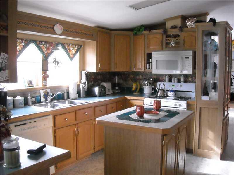 2 Salmon Stream Road Guilford, ME 04443 - Photo 3 of 9 Kitchen. Nice u shape kitchen with a...