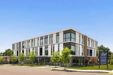 a front view of a multi story building