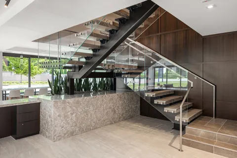 a view of a hallway with seating space