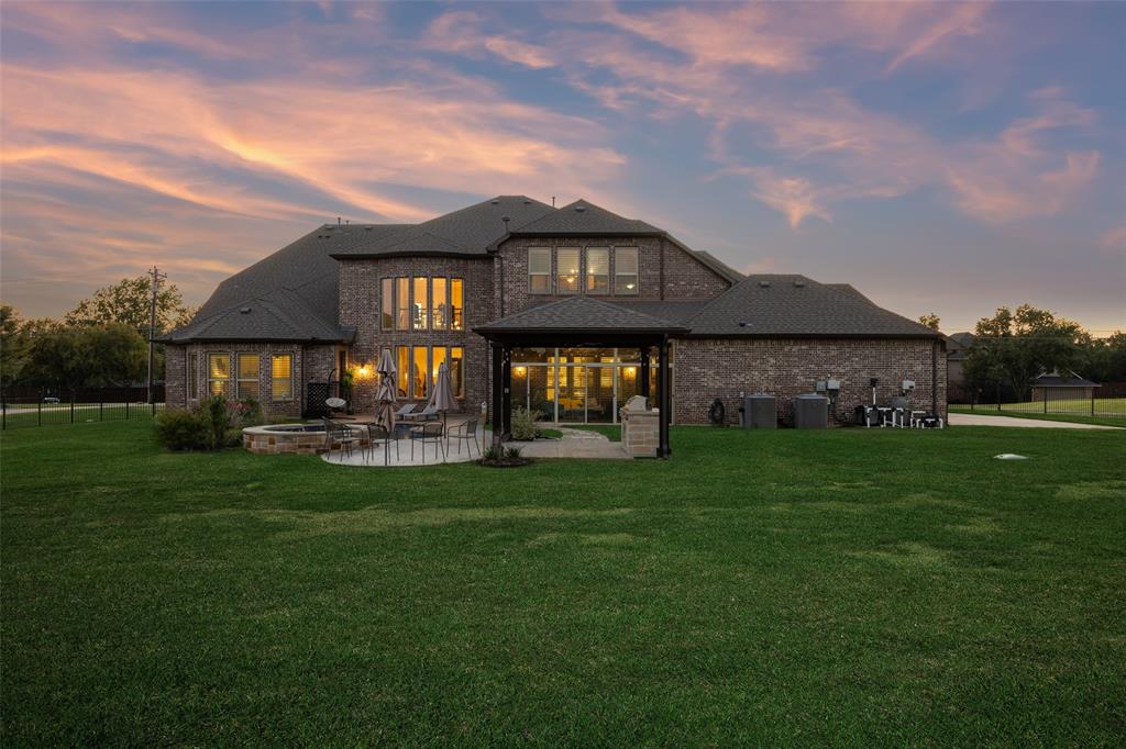 715 Simmons Road Double Oak, TX 75077 - Photo 40 of 40 a front view of a house with a garden