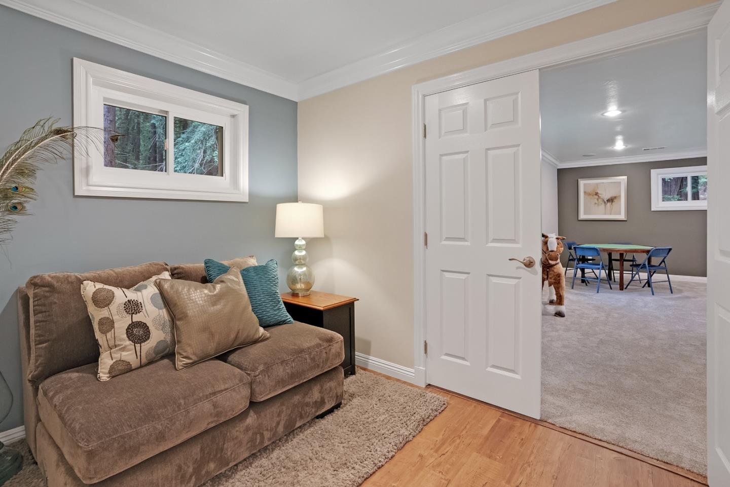 169 Sequoia Grove Ben Lomond, CA 95005 - Photo 16 of 42 a living room with furniture and a table