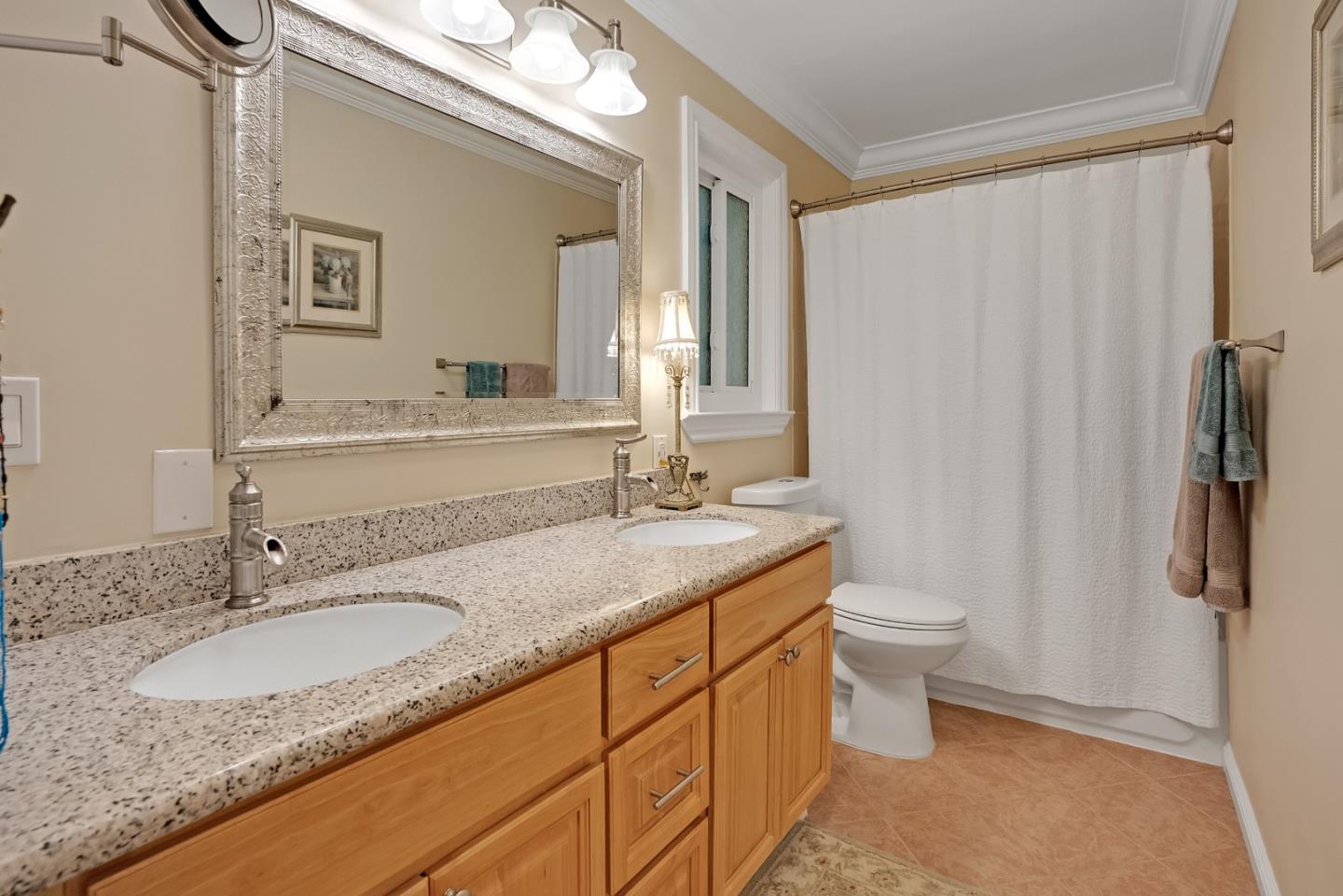 169 Sequoia Grove Ben Lomond, CA 95005 - Photo 23 of 42 a bathroom with a granite countertop sink and a mirror