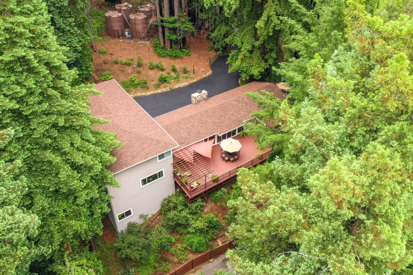 169 Sequoia Grove Ben Lomond, CA 95005 - Photo 10 of 42 an aerial view of a house with a yard and trees