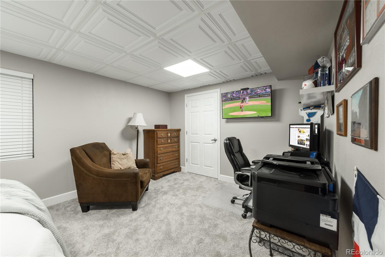 9548 South Castle Ridge Circle Highlands Ranch, CO 80129 - Photo 25 of 31 a view of workspace with lounge chair