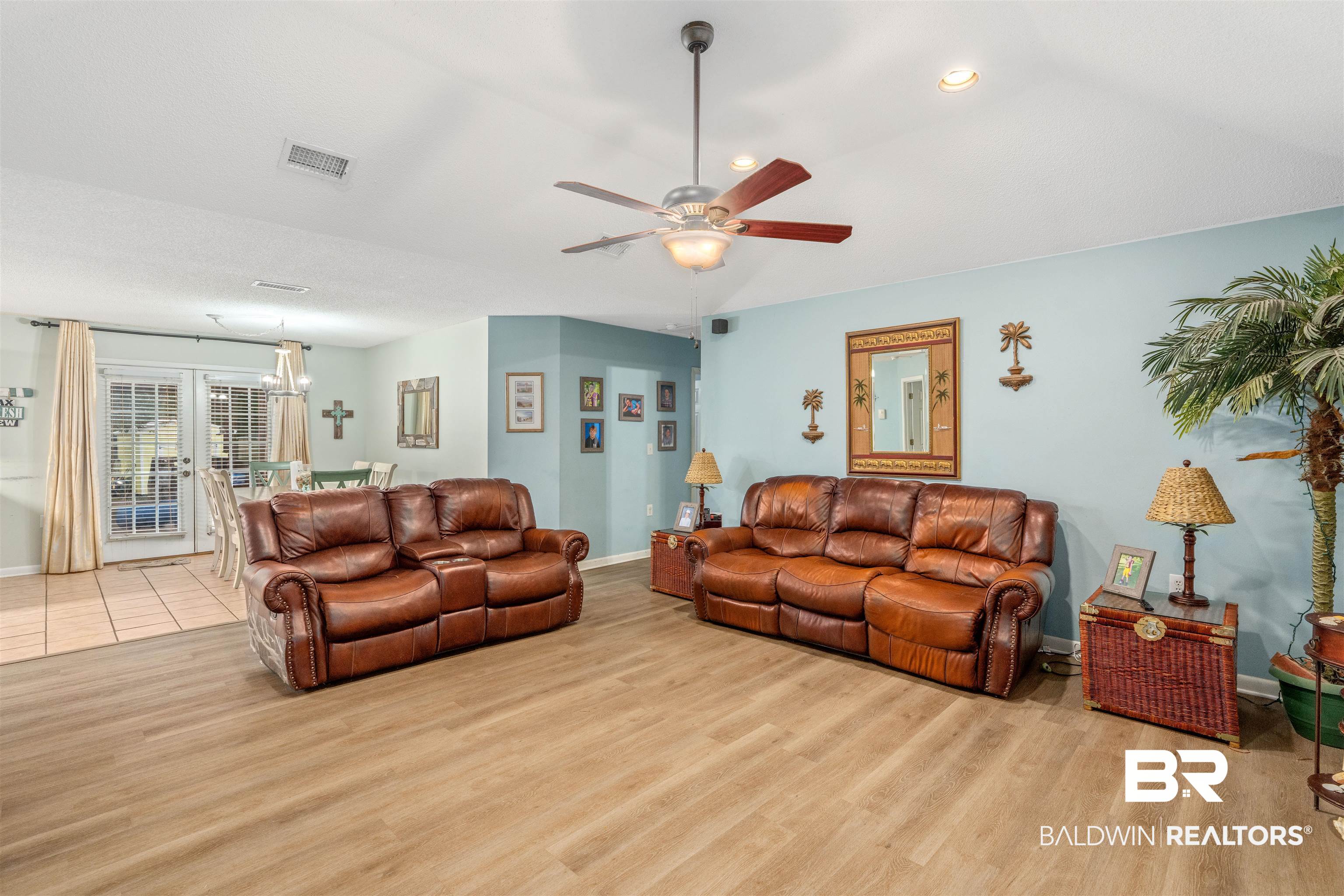 23186 Pecan Street Robertsdale, AL 36567 - Photo 3 of 36 Living room with ceiling fan, light wood-type flooring, recessed lighting, and a chandelier