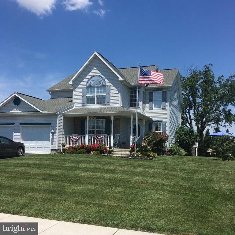 86 Barley Circle Hanover, PA 17331 - Photo 1 of 1 a front view of a house with a garden