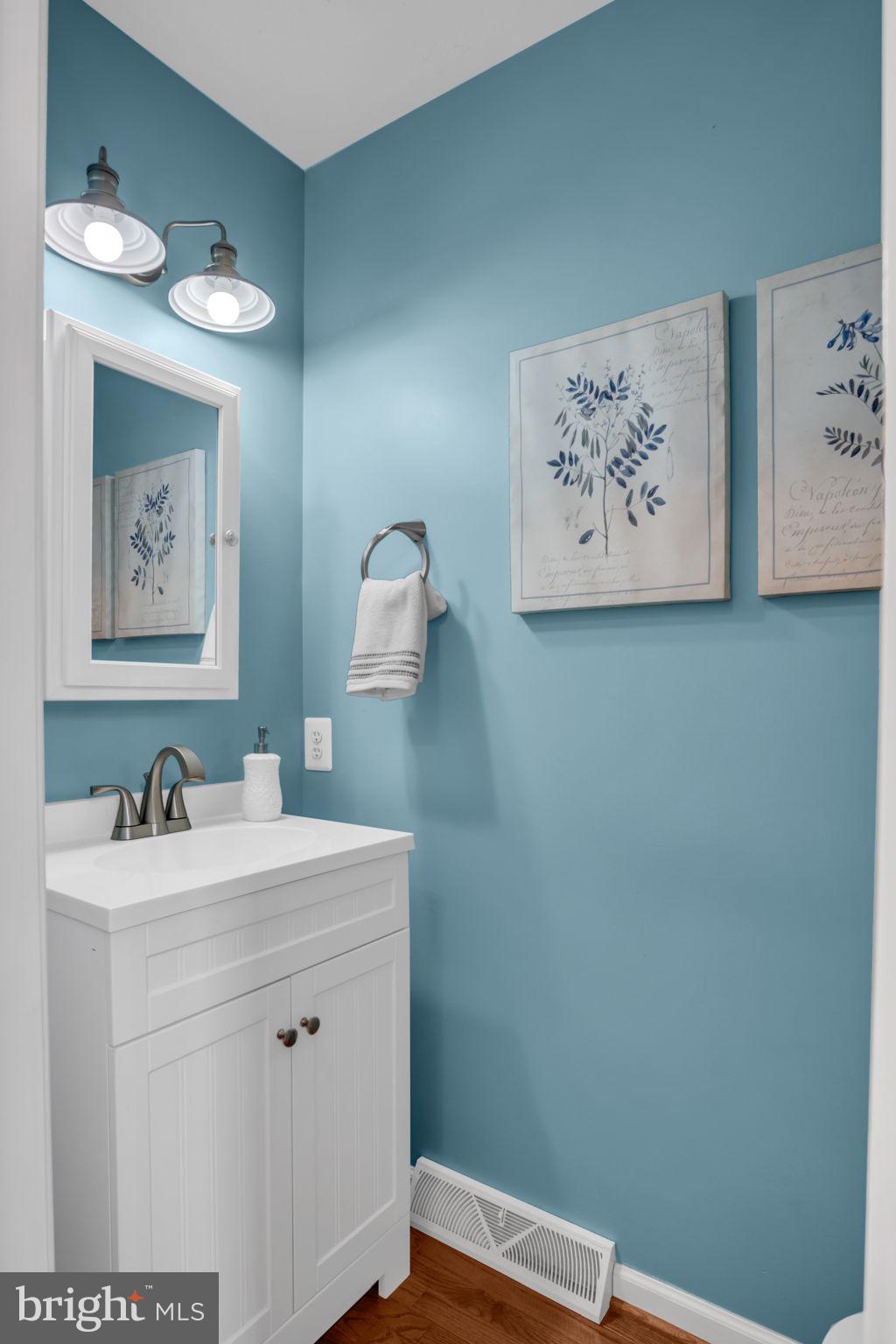 86 Barley Circle Hanover, PA 17331 - Photo 19 of 57 a bathroom with a sink mirror and vanity