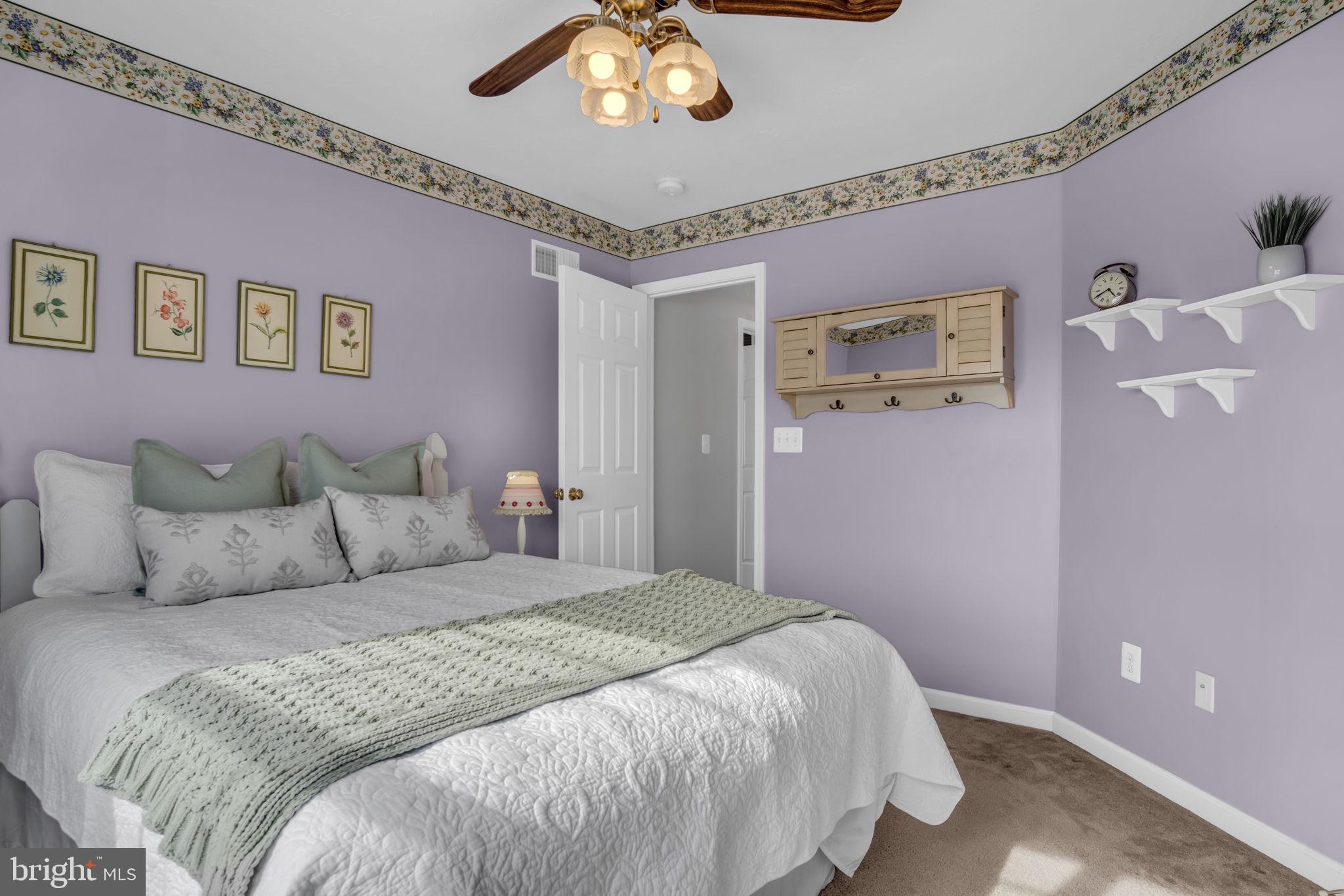 86 Barley Circle Hanover, PA 17331 - Photo 24 of 57 a bedroom with a bed and a chandelier