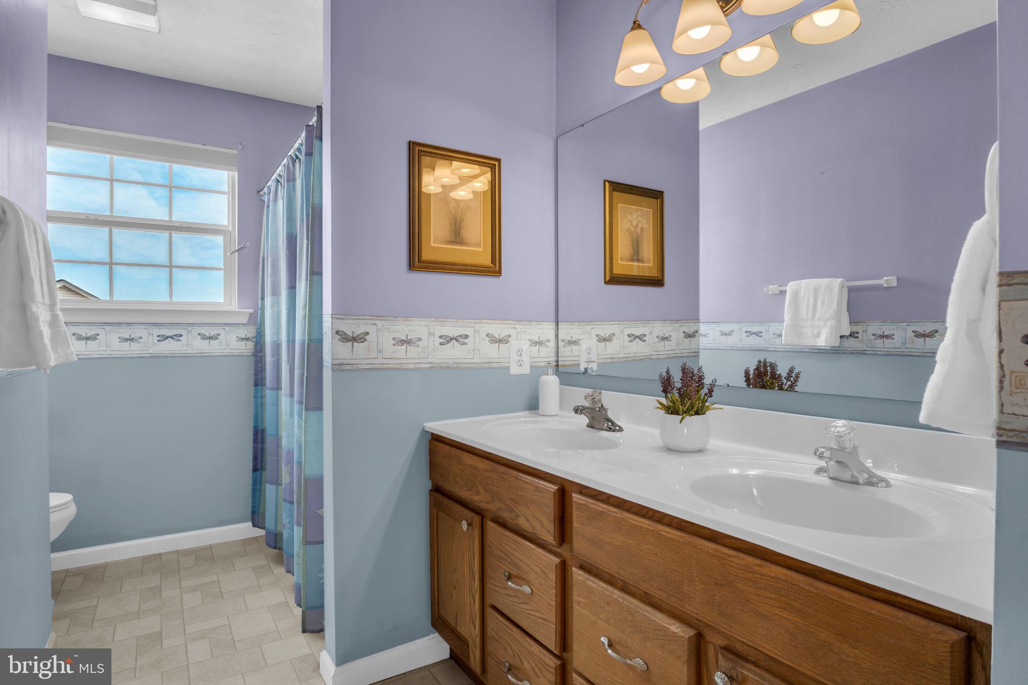 86 Barley Circle Hanover, PA 17331 - Photo 27 of 57 a bathroom with a sink a vanity and a mirror
