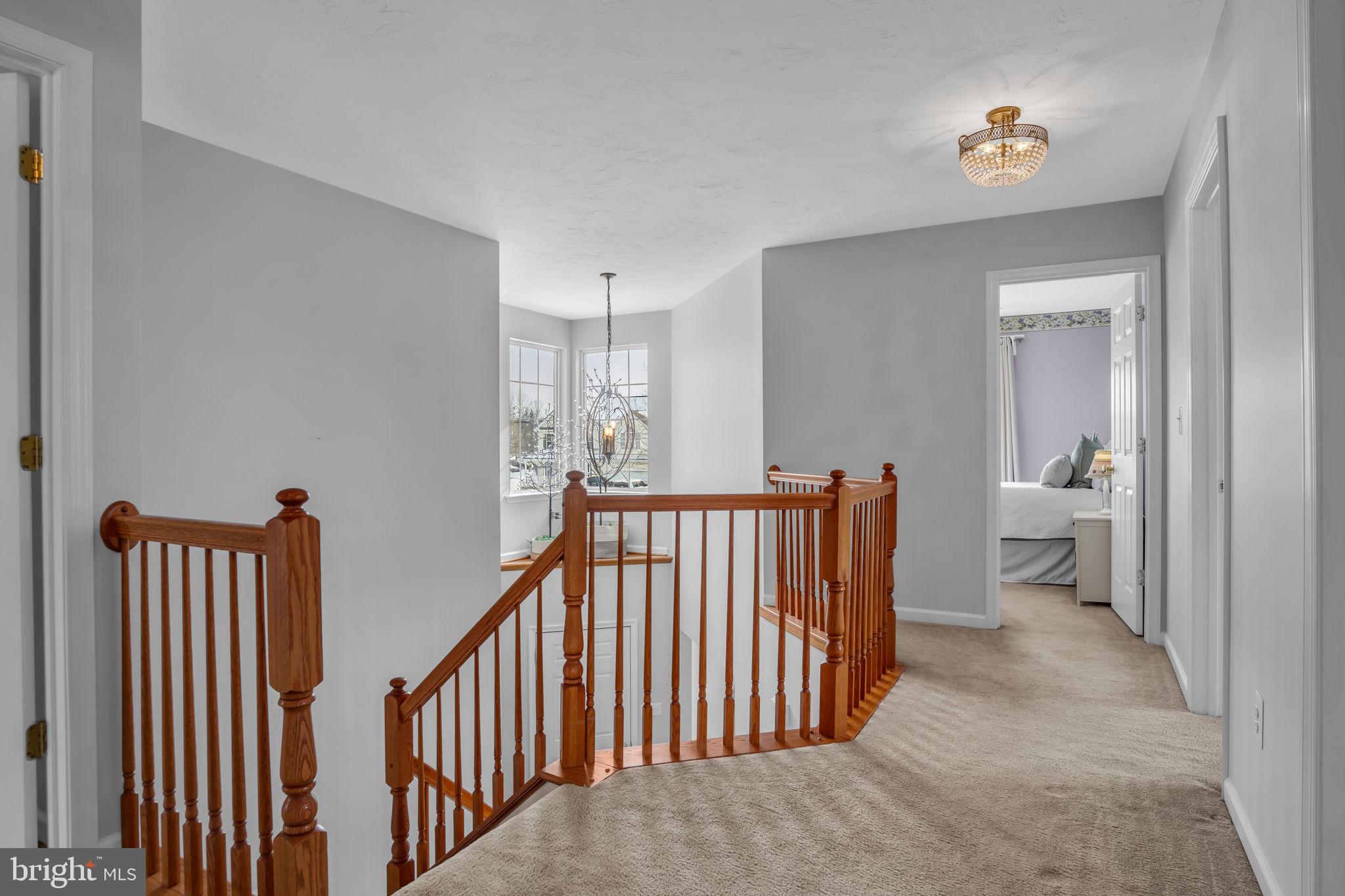 86 Barley Circle Hanover, PA 17331 - Photo 30 of 57 a view of a hallway with windows and a livingroom