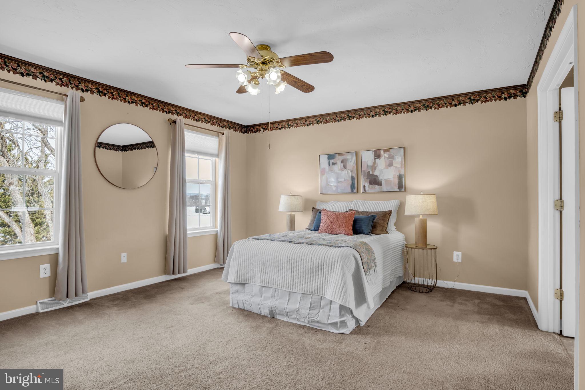 86 Barley Circle Hanover, PA 17331 - Photo 31 of 57 a spacious bedroom with a bed and a window