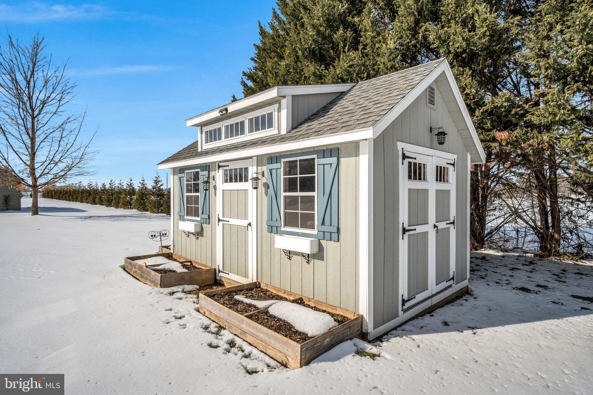 86 Barley Circle Hanover, PA 17331 - Photo 44 of 57 a view of a white house next to a yard with wooden fence