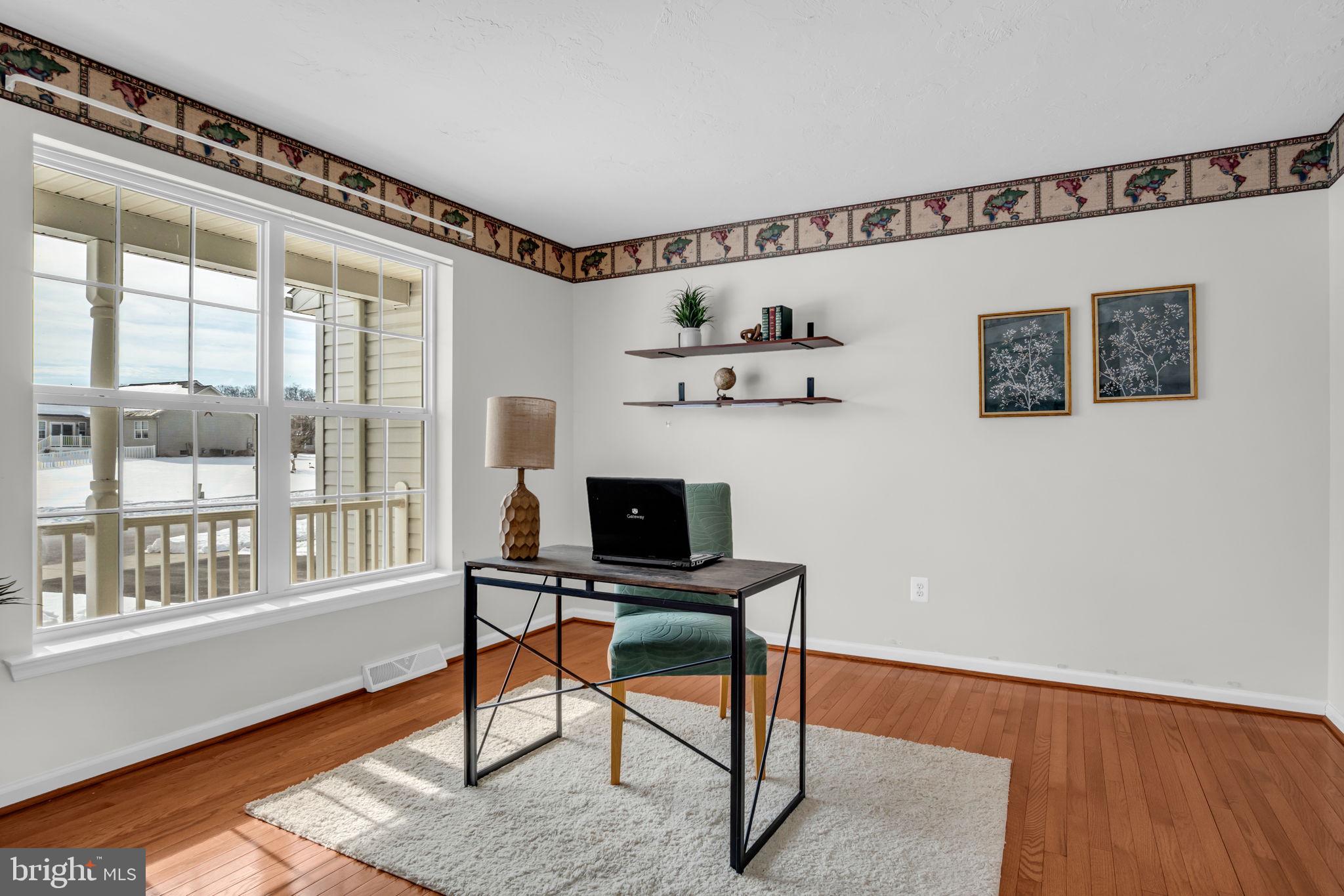 86 Barley Circle Hanover, PA 17331 - Photo 6 of 57 a view of a workspace with furniture and a window