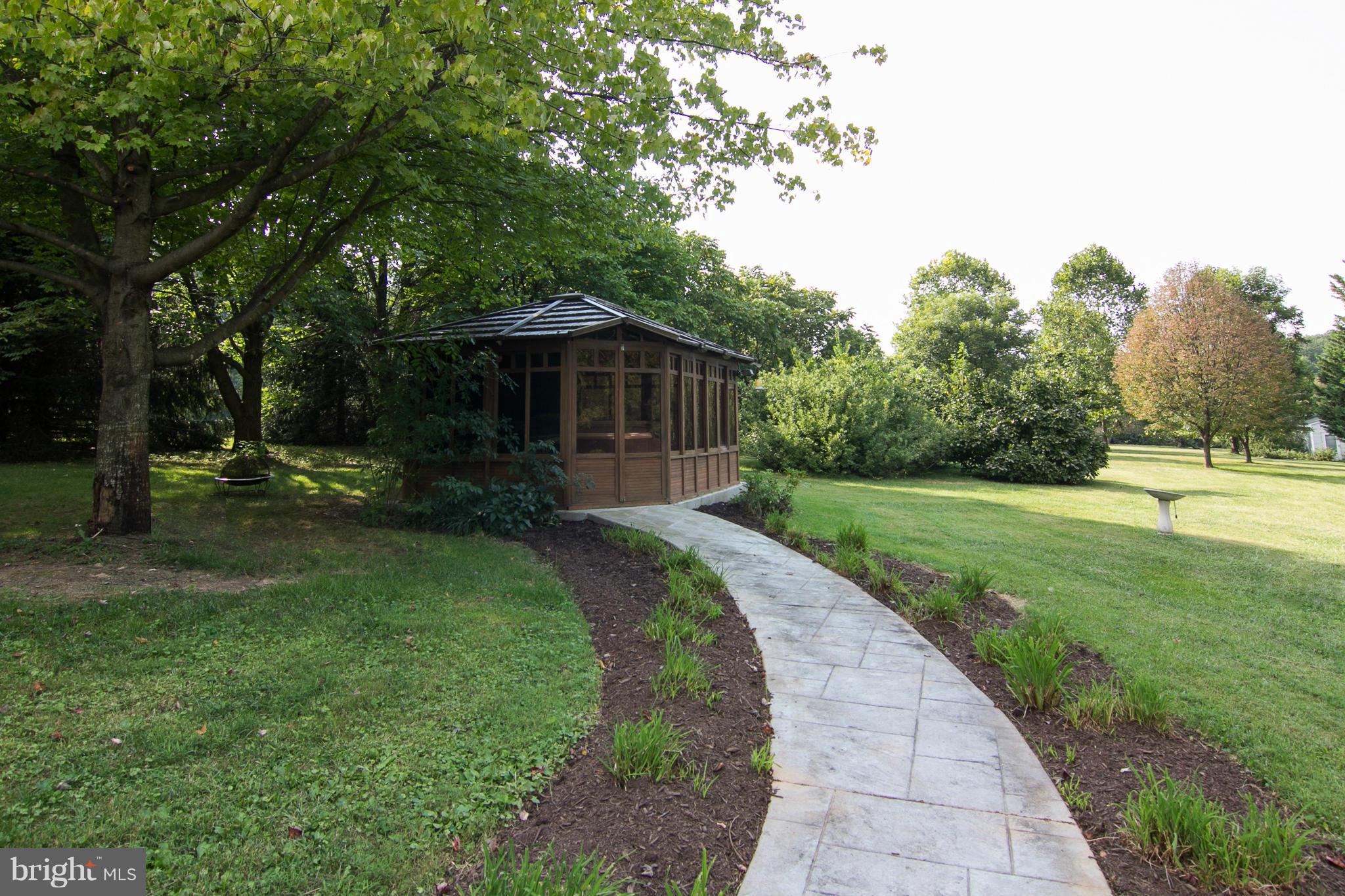 1766 Bloom Road Westminster, MD 21157 - Photo 26 of 29 a view of a garden with an trees